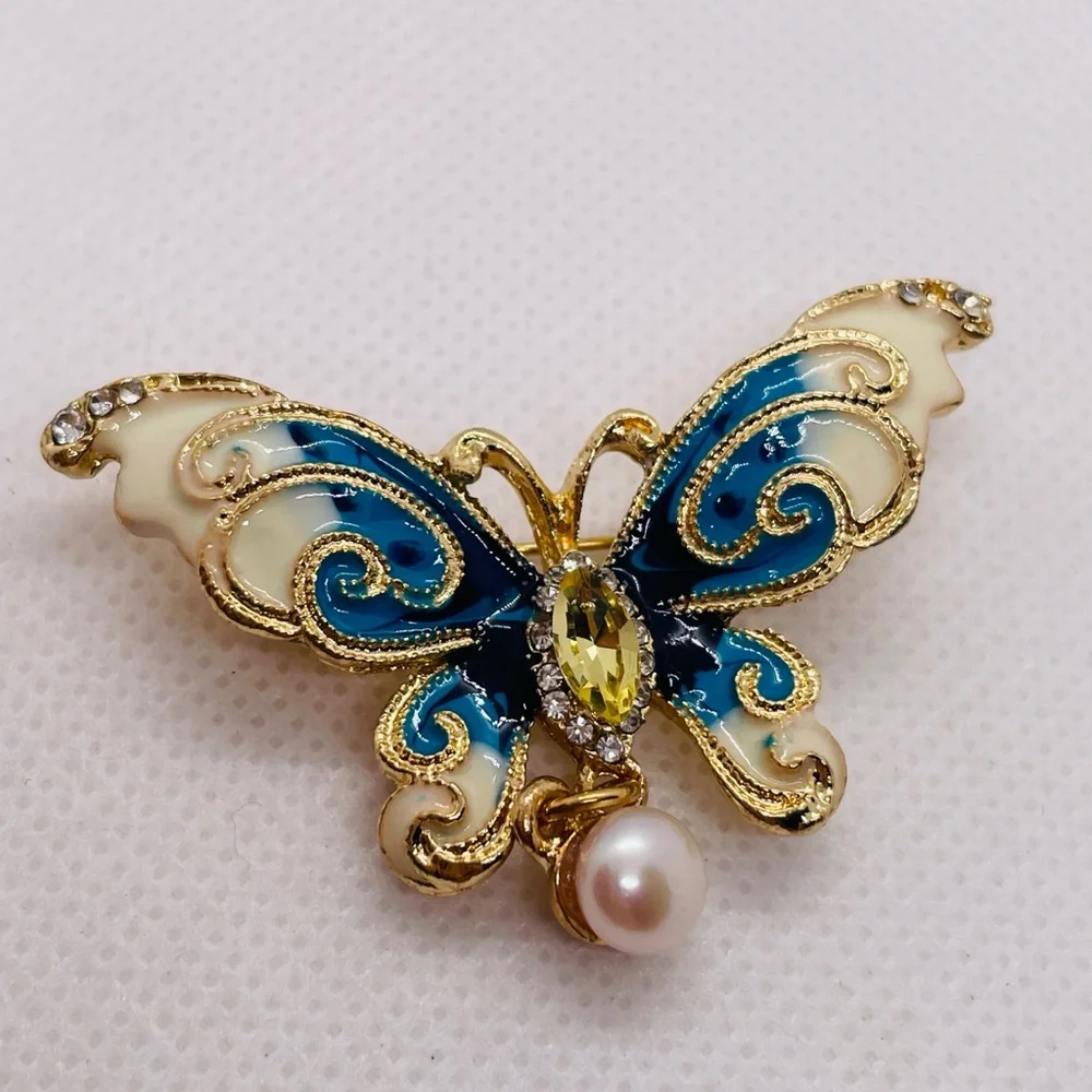 Elegant Gold and Blue Butterfly Brooch